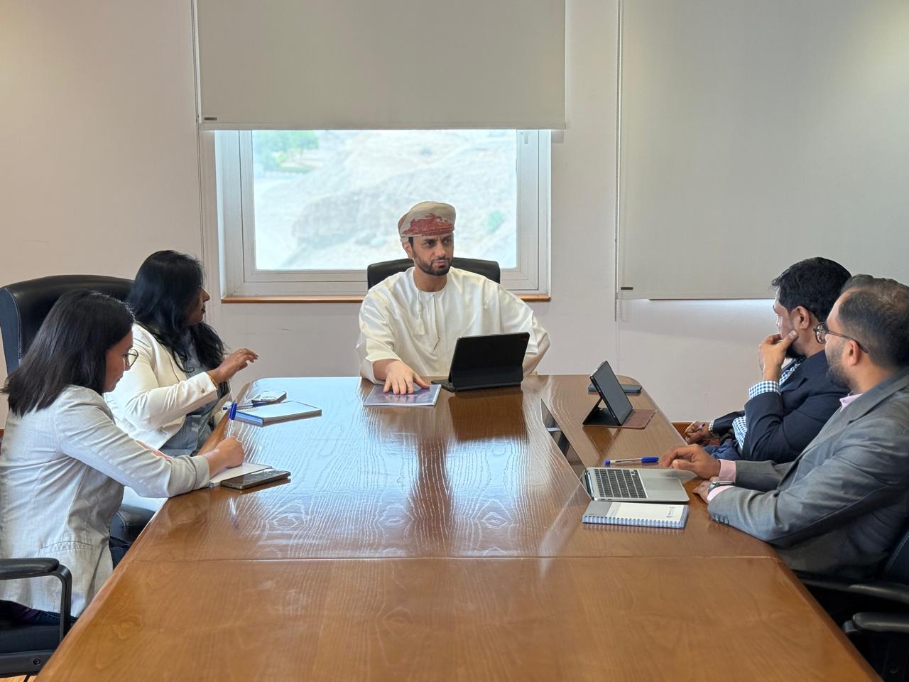 Morison Muscat team in a meeting